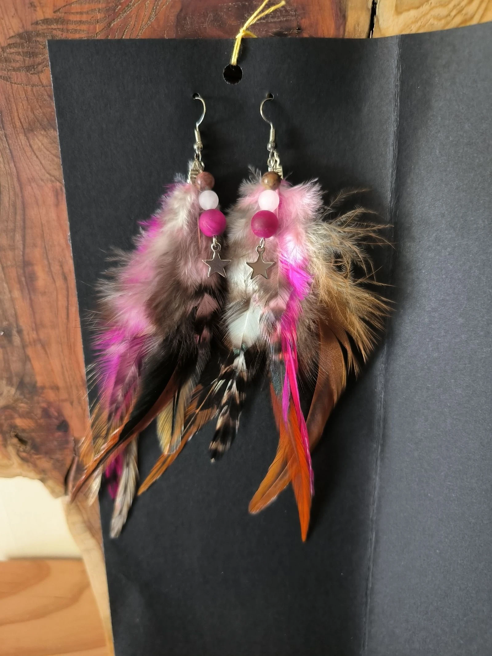 Boucles d'oreilles style hippie en plumes naturelles 